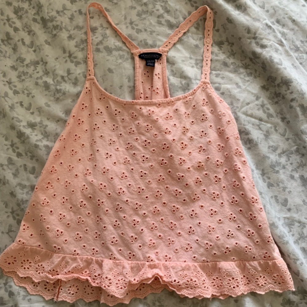 Pink thin strapped crop top.